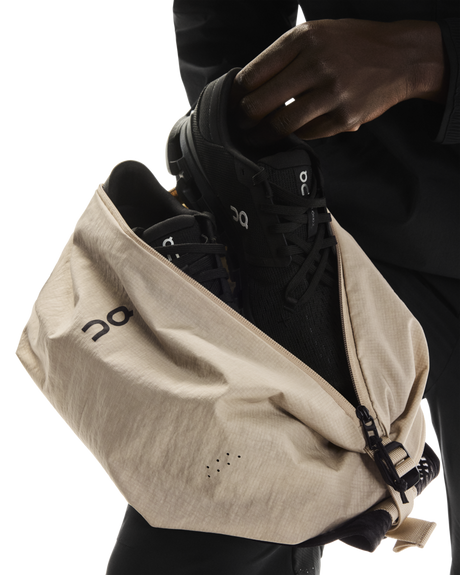 On Unisex Sling Pack 9L - Sand / Black