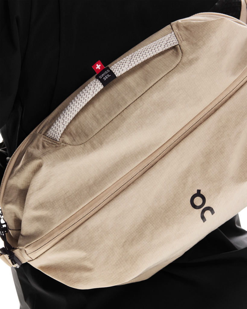 On Unisex Sling Pack 9L - Sand / Black