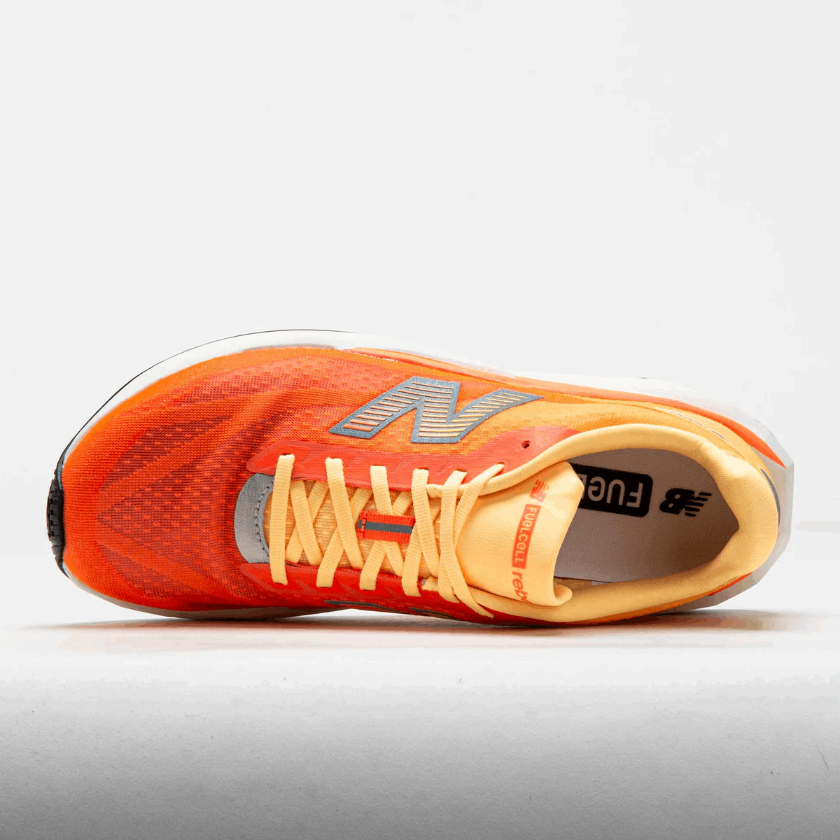 Buy New Balance Men FuelCell Rebel V5 - Tangerine Heat / Silver Metallic for running in Singapore - Running Lab SG