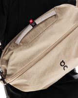 On Unisex Sling Pack 9L - Sand / Black