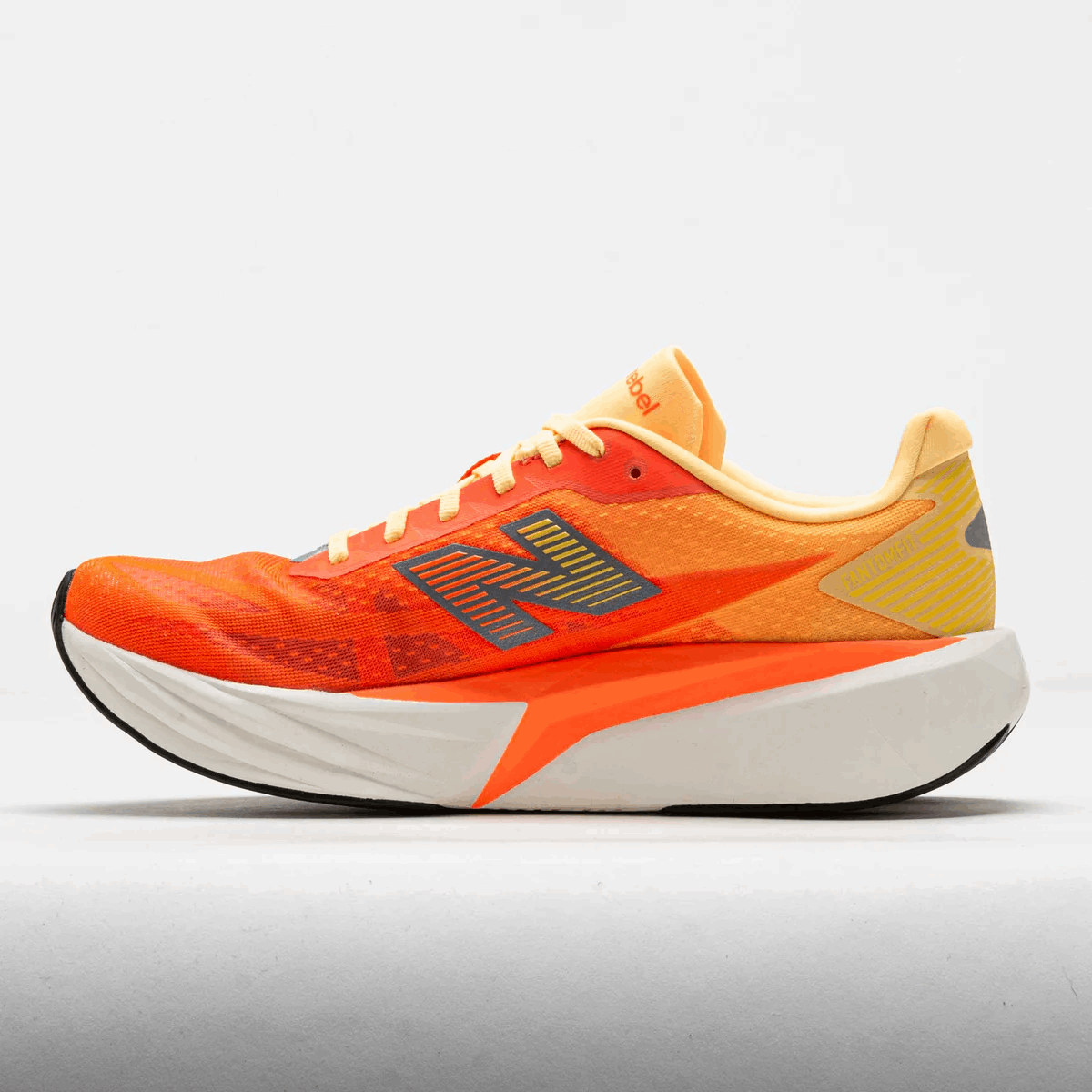 Buy New Balance Men FuelCell Rebel V5 - Tangerine Heat / Silver Metallic for running in Singapore - Running Lab SG