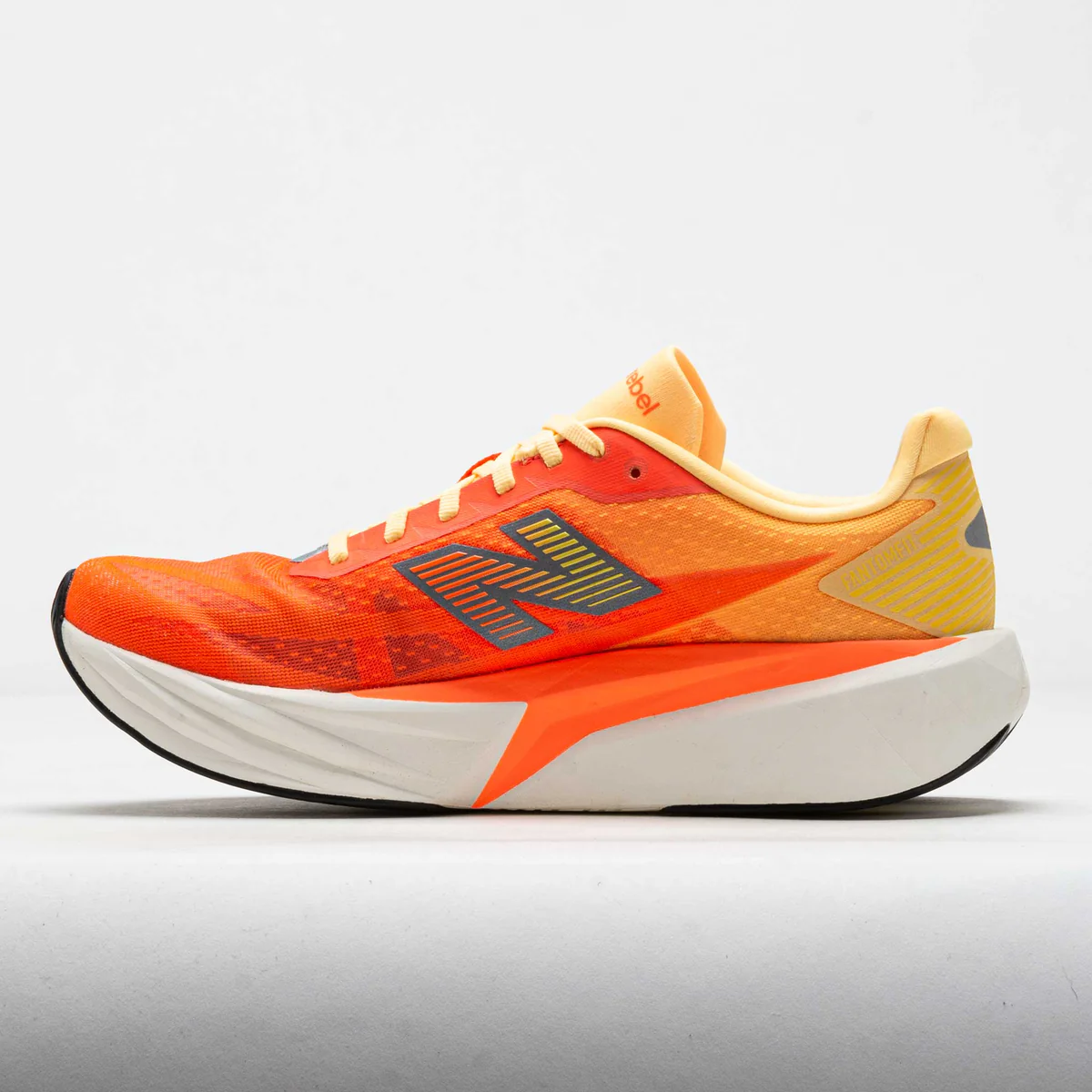 Buy New Balance Men FuelCell Rebel V5 - Tangerine Heat / Silver Metallic for running in Singapore - Running Lab SG