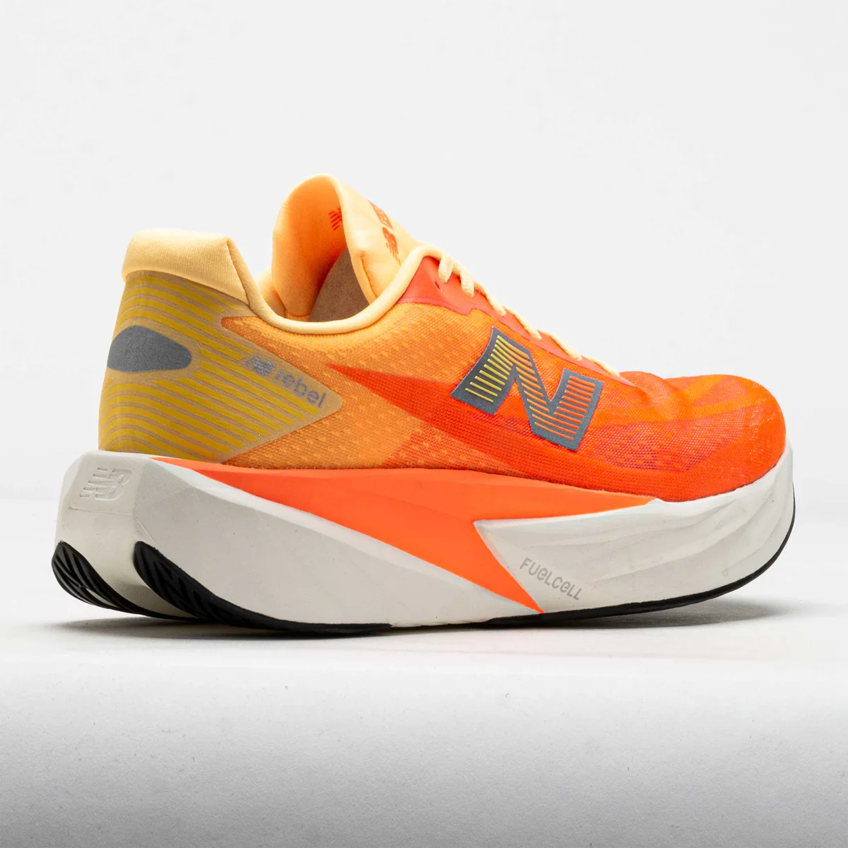 Buy New Balance Men FuelCell Rebel V5 - Tangerine Heat / Silver Metallic for running in Singapore - Running Lab SG