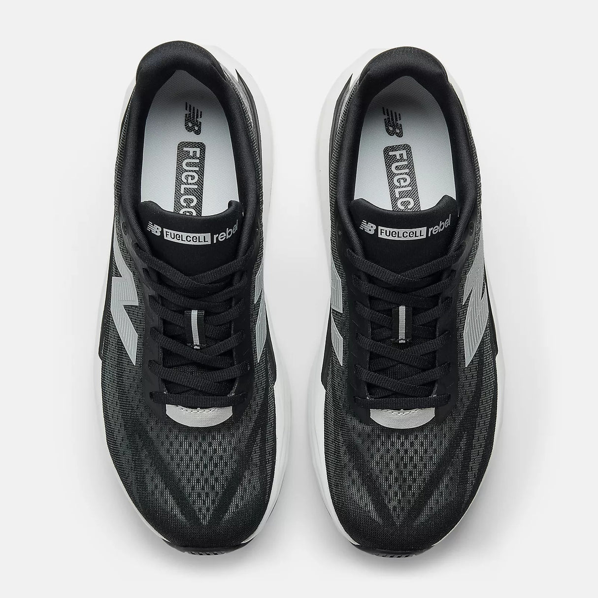 Buy New Balance Men FuelCell Rebel V5 Wide - Black / Silver Metallic for running in Singapore - Running Lab SG
